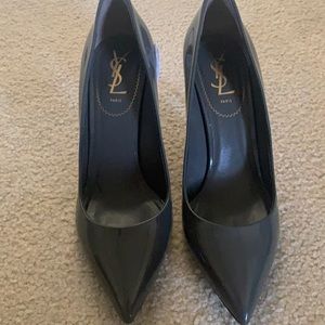 Yves St Laurent Paris patent pumps.